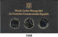 Deutsche Demokratische Republik,Thematische Sätze  Martin-Luther-Ehrung der DDR  5 Mark 1983  Wartburg , Luthers Geburtshaus in Eisleben, Schloßkirche in Wittenberg.  Im Münzrahmen mit Aufschrift 