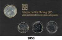 Deutsche Demokratische Republik,Thematische Sätze  Martin-Luther-Ehrung der DDR  20 Mark 1983  Martin Luther; 5 Mark 1983  Wartburg, Luthers Geburtshaus in Eisleben und Schloßkirche in Wittenberg.  Im Münzrahmen mit Aufschrift 