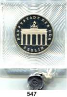 Deutsche Demokratische Republik,  5 Mark 1986.  Brandenburger Tor.  In Kapsel mit Plombe 