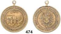 M E D A I L L E N,Eisenbahn Bronzemedaille mit angeprägter Öse o.J. (G. B. Wiesb.). Dampflok auf Viadukt. / Reichsadler. 28,5 mm. 8,42 g.